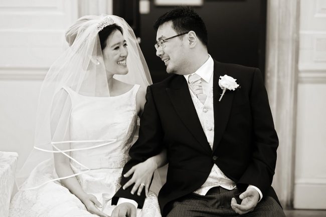 The Queen’s House wedding photographer – 1 a bride & groom share a moment after their wedding at The Queen's House