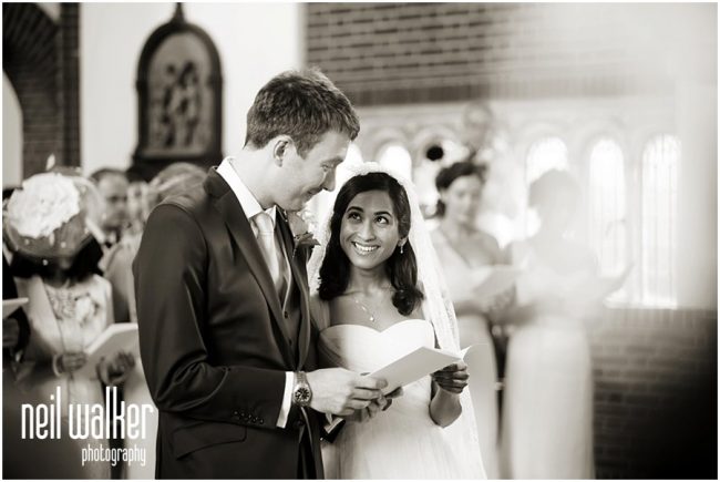 Slaugham-Place-Wedding-_0014 a bride & groom looking at each other during the ceremony