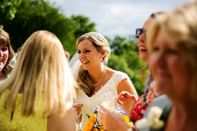 Pembroke-Lodge-Wedding-1 a bride laughing at a Pembroke Lodge wedding