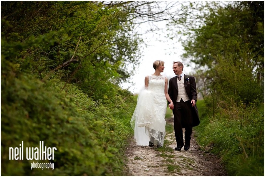 A bride & groom at a wedding at Upwaltham Barns in Sussex