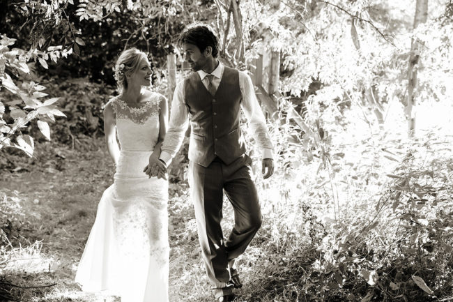 Sussex Marquee Wedding – 1 a bride & groom looking at each other at their Sussex marquee wedding