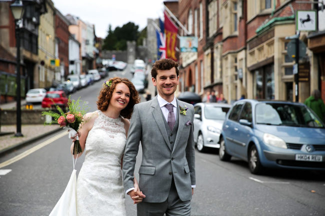Arundel Town Hall Wedding – 1 the bride & groom walking away from Arundel Town Hall
