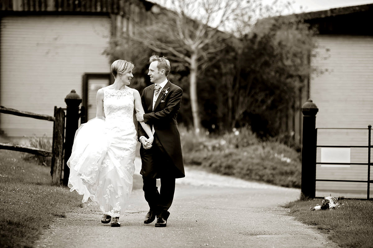 the bride & groom walking together