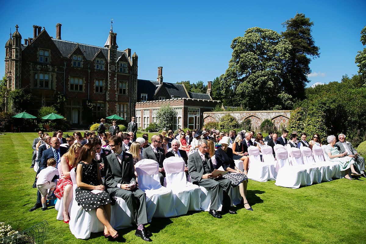 an outside ceremony for a wedding at Horsted Place