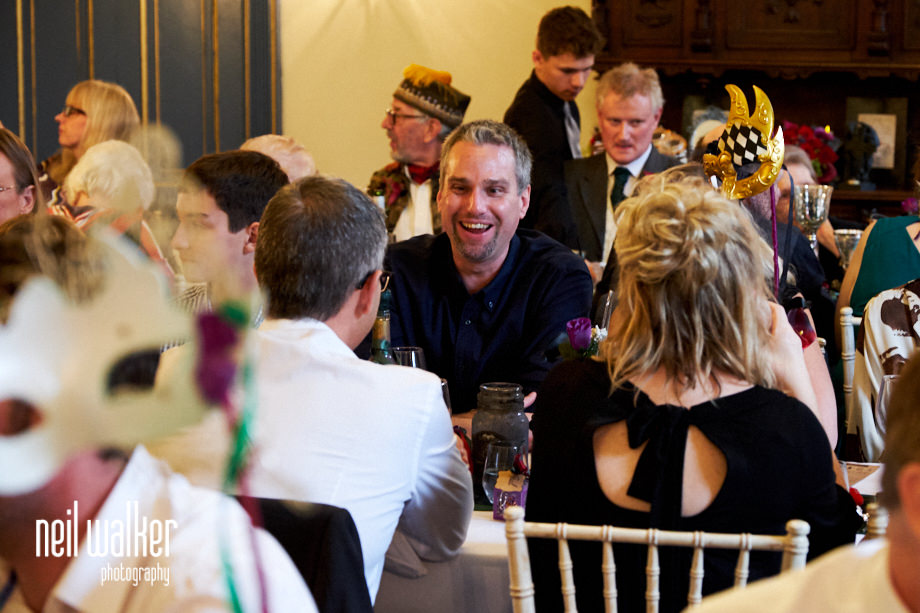 a guests laughing at a joke