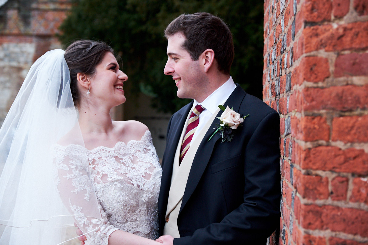 Farnham Castle Wedding Photographer a bride and groom enjoy their wedding day at Farnham Castle