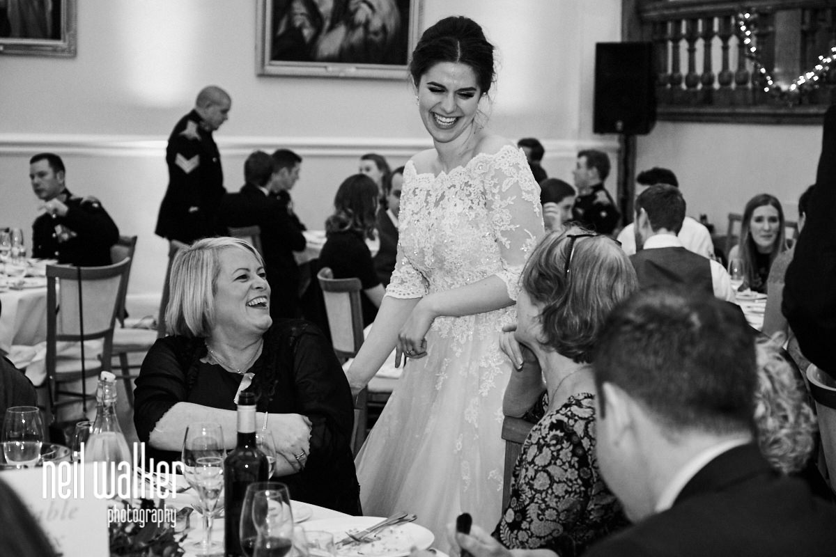 the bride talking to guests