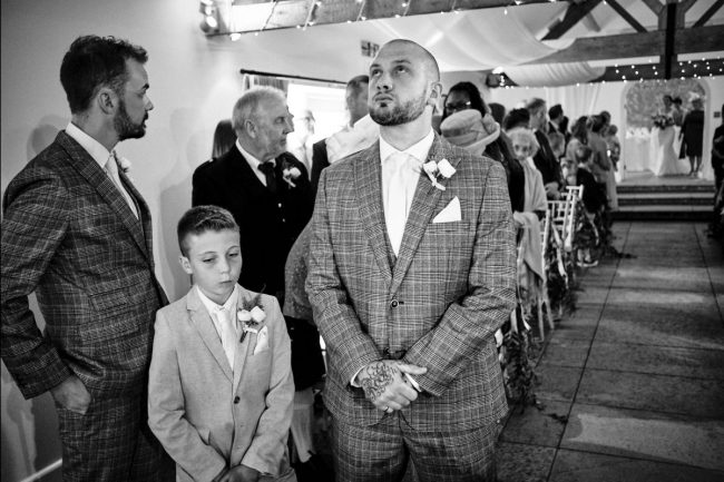 The-Groom-0001 The groom waiting for his bride at a Sussex wedding at Farbridge Barns.